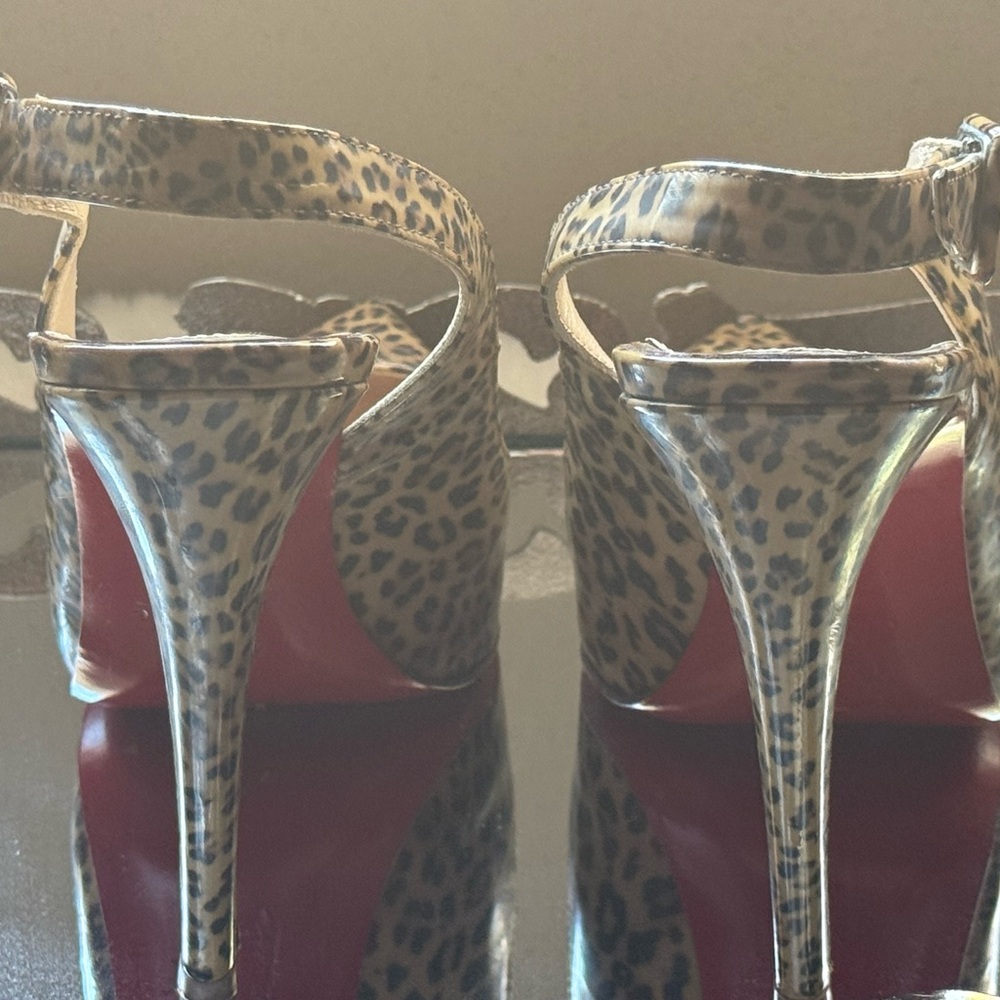 CHRISTIAN LOUBOUTIN
Leopard Print Patent Leather Rolande Slingbacks Size 37 EU.